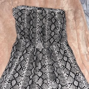 Snakeskin romper , worn once , fashion nova